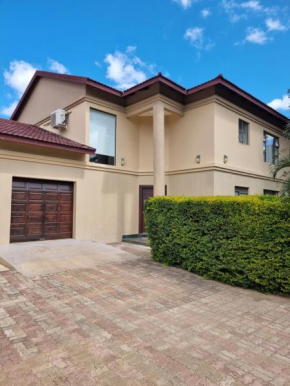 Beautiful 3 bedroom home in a gated complex with private garden and pool